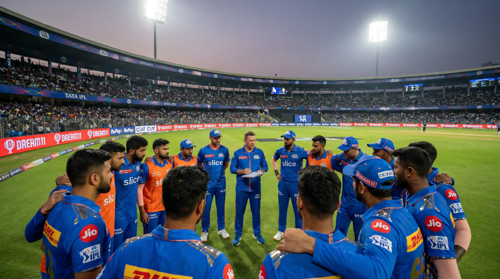 Team huddle during a strategic break in a Hundred cricket match