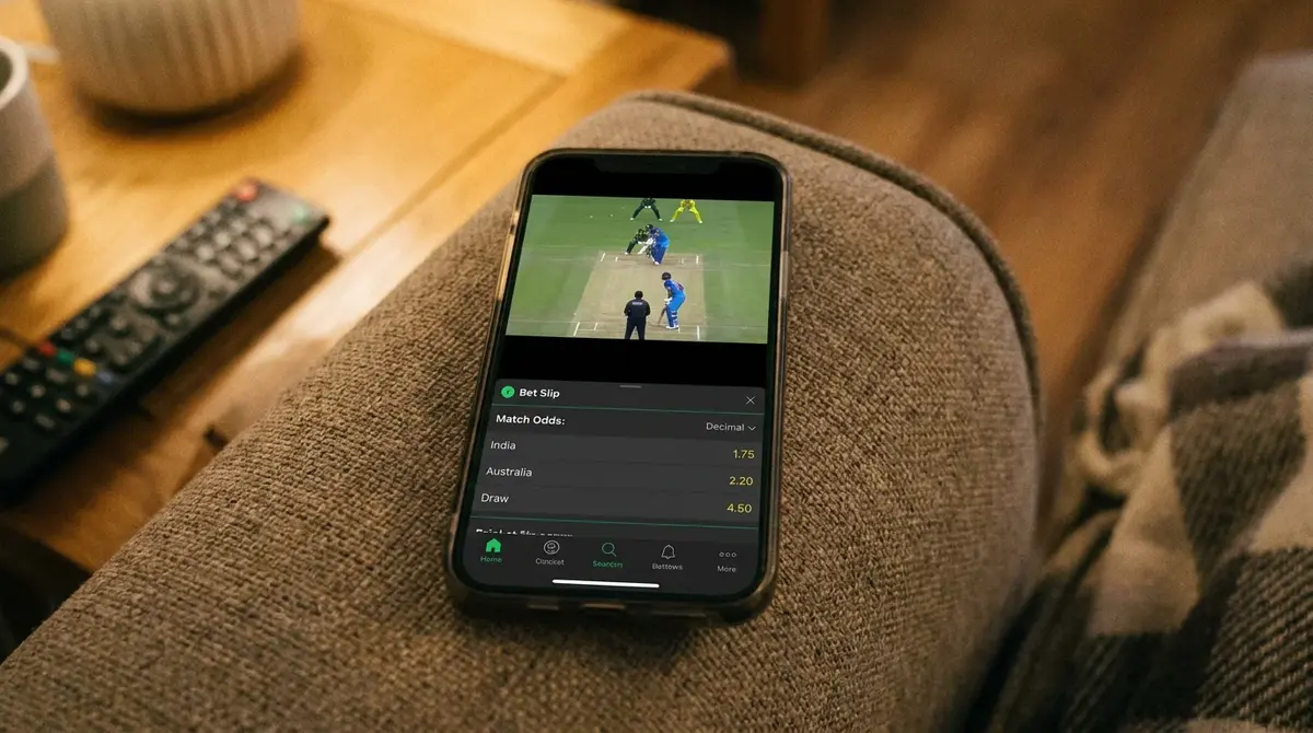 Live cricket stream embedded inside a mobile betting app above the bet slip