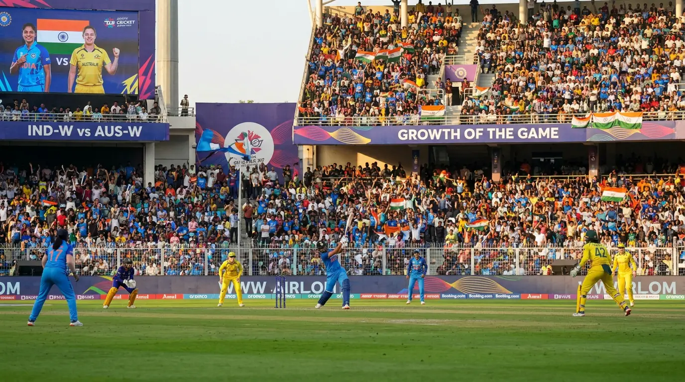 Women's cricket match in progress at a packed stadium with enthusiastic supporters